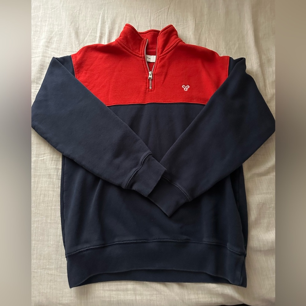 TNA red and blue quarter-zip crewneck. Size medium.